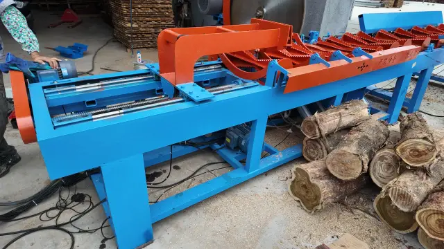 LW-CS1200P cut-off saw loaded with logs on the infeed conveyor